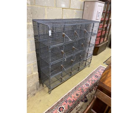 A pair of vintage wrought iron and wirework 20 door lockers, each width 153cm, depth 32cm, height 137cm