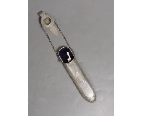 A late Victorian engine turned silver spectacles case, Saunders &amp; Shepherd, London 1900, 17cm containing an earlier pair 