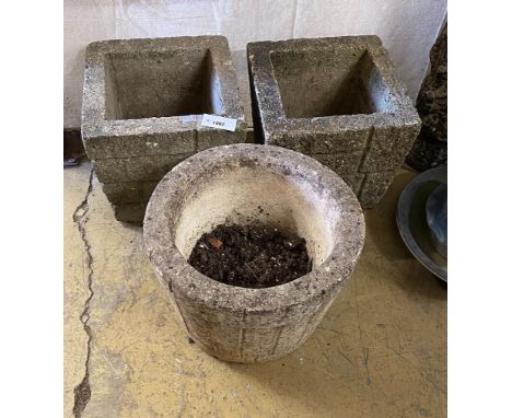 A pair of reconstituted stone 'brick' square garden planters, width 33cm, height 30cm together with a similar circular garden