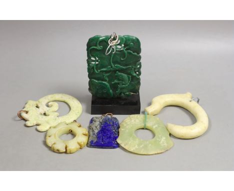 A large Chinese jadeite ‘fish’ plaque, 10 cm high and five various hardstone or bowenite jade plaques