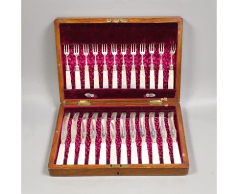 A cased set of late Victorian and later silver and mother of pearl handled dessert eaters, Martin, Hall &amp; Co, Sheffield, 