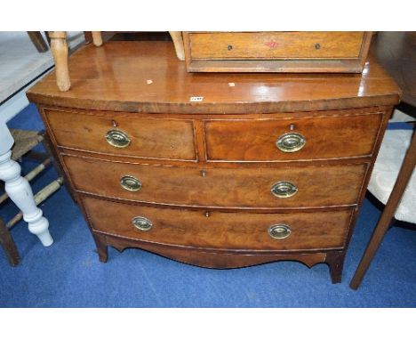 A GEORGIAN BOWFRONT CHEST, of two over three long drawers (sd)