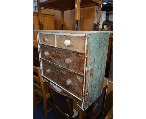 A SEMI STRIPPED CHEST OF FOUR DRAWERS