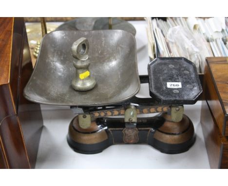 A SET OF CO-OPERATIVE SCALES, with a 2lb bell weight