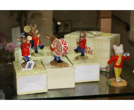 A BOXED ROYAL DOULTON BUNNYKINS FIVE PIECE 'OOMPAH BAND', to include 'Sousaphone' DB23, 'Trumpeter' DB24, 'Cymbals' DB25, 'Dr