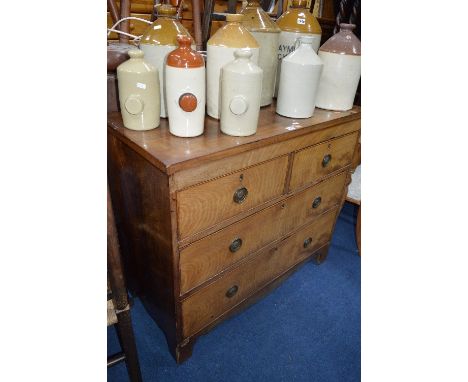 A LATE GEORGIAN MAHOGANY CHEST, of two short and two long drawers (s.d., veneer lifting)