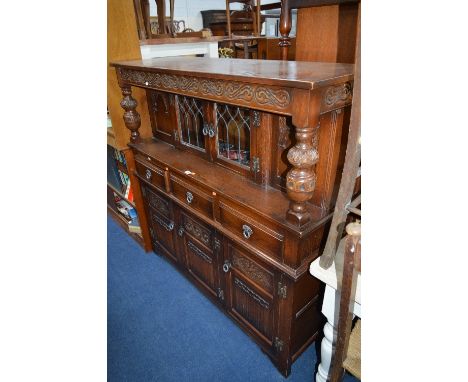 AN OLD CHARM COURT CUPBOARD, with three drawers