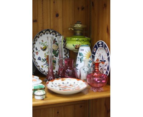 A LATE VICTORIAN BRASS BASED OIL LAMP, with painted green glass reservoir, cranberry glass, Kutani dish, etc (11)