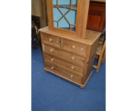 A MODERN PINE CHEST, of two short and three long drawers