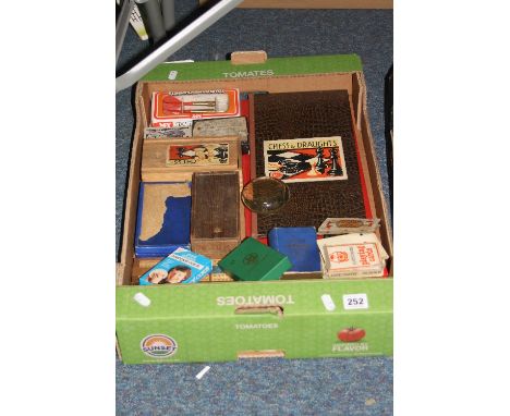A QUANTITY OF ASSORTED GAMES, chess, draughts, card games, packs of playing cards, darts, peg boards, etc