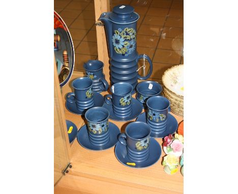 A 1960'S/70'S CARLTONWARE COFFEE SET, florally decorated on blue ground, comprising coffee pot, milk jug, sugar bowl, six cup