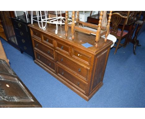 A PINE CHEST OF EIGHT DRAWERS