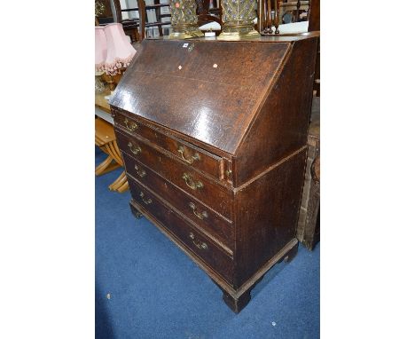 A GEORGE III AND LATER OAK TWO SECTION BUREAU, with four drawers, fitted interior and brass swan neck handles, approximate si