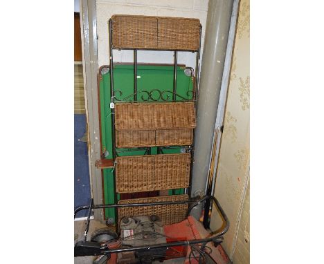 A 4' POOL TABLE,with balls and two cues and a wicker and iron shelf unit