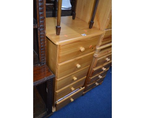 A TALL SLIM PINE CHEST, of five drawers