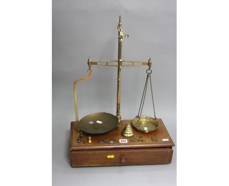 A BRASS SET OF BALANCE SCALES, with various weights