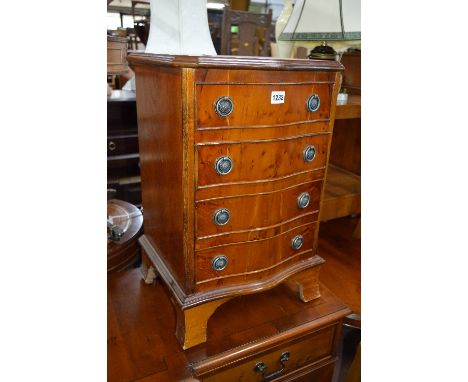 A SMALL YEW WOOD CHEST, of four drawers (sd)