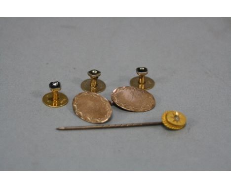 A 15CT GOLD AND DIAMOND STICK PIN, a 9ct cufflink and three 18ct shirt studs (5)