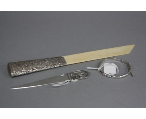 A LATE VICTORIAN SILVER HANDLED IVORY PAGE TURNER/LETTER OPENER, marks partially rubbed, Birmingham 1892, length 28.5cm, toge