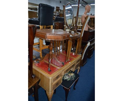 A WALNUT NEST OF THREE TABLES, an Edwardian swing mirror, drum table, stool and a standard lamp (5)