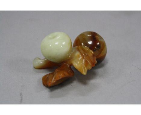 A JADE CARVING OF A CHERRY