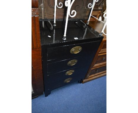 A BLACK ORIENTAL STYLE CHEST OF FOUR DRAWERS