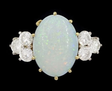 18ct gold opal and six stone round brilliant cut diamond ring, London 1977, opal approx 2.60 carat, total diamond weight appr