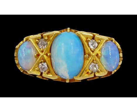 Victorian 18ct gold three stone opal ring, with four diamond accents set betweenCondition Report:Approx 3.8gm, size M-N, test