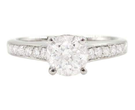 Platinum single stone round brilliant cut diamond ring, with channel set diamond shoulders, principal diamond approx 1.00 car