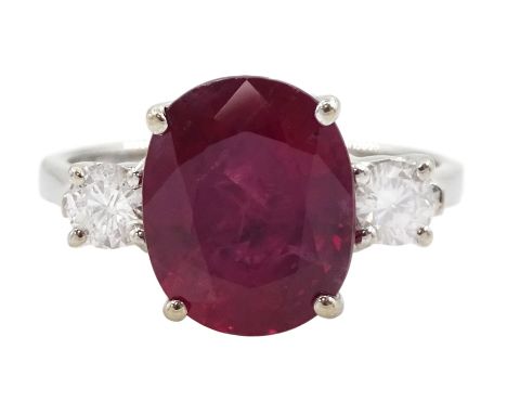 18ct white gold three stone oval cut ruby and round brilliant cut diamond ring, hallmarked, ruby approx 4.30 caratCondition R