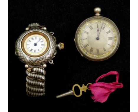 Early 20th century gunmetal manual wind wristwatch, in a niello silver case, on integrated expanding niello silver bracelet, 