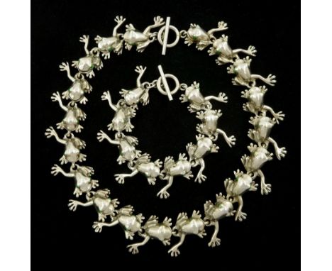 Silver frog link necklace and matching silver braceletCondition Report:Approx 150gm, tested 925 silver, necklace length = 43c