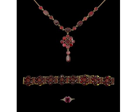 9ct rose gold foiled back garnet pendant necklace, 9ct gold single stone garnet ring and a gilt bohemian garnet braceletCondi