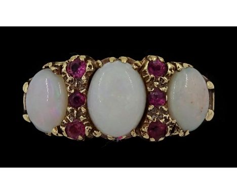 Gold opal and ruby ring, stamped 9ctCondition Report:Approx 4.45gm, size L, max depth = 8.8mm