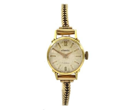 Atlantic ladies 18ct gold manual wind wristwatch, on 9ct gold bracelet, both hallmarkedCondition Report:Back case only approx