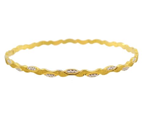 22ct gold bangle, with white gold bead highlightsCondition Report:Approx 12.15gm, tested 22ct, inner circumference = 19.2cm