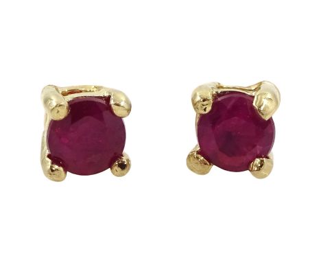Pair of 9ct gold ruby stud earrings, stamp[ed 375Condition Report:Approx 0.4gm, diameter = 2.8mm, good condition