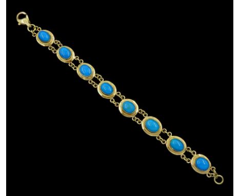 14ct gold oval turquoise link bracelet, stamped 585Condition Report:Approx 20.1gm, tested 14ct, length = 18cm, max link = 12m