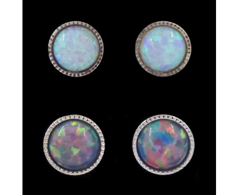 Two pairs of silver opal stud earringsCondition Report:Good condition