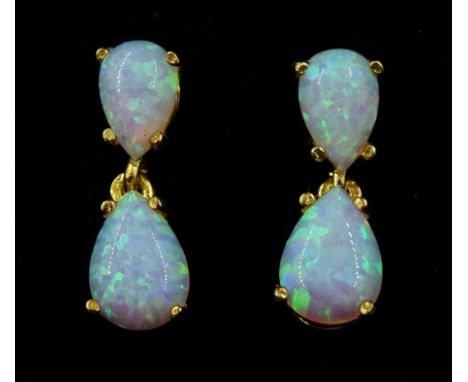 Pair of silver-gilt opal pendant stud earringsCondition Report:length = 15mm, tested, good condition