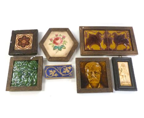 Quantity of 19th century tiles with Majolica style finishes, possibly Minton, including encaustic example and a further frame