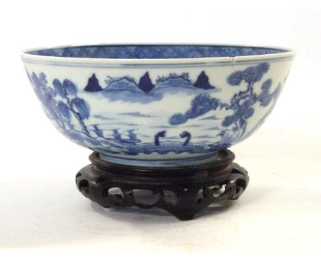 19th Century Chinese porcelain bowl with blue and white design in Kangxi style, four character marker to base (chips to rim),