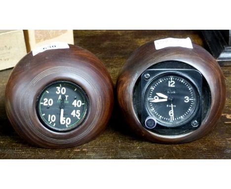 Aircraft interest - an Elgin 8-day aircraft clock together with a similar Altimeter, later set into two modified hardwood law