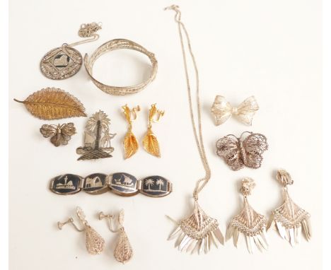 A filigree bangle, filigree brooches, a pair of gilt filigree earrings, niello bracelet etc