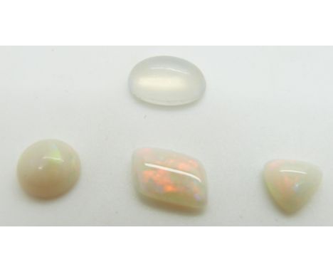 Three loose opal cabochons and a loose moonstone cabochon&nbsp;