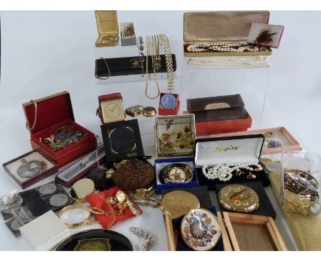 A collection of costume jewellery including Monet, Napier, Stratton compacts, brooches, necklaces, earrings, rolled gold bang