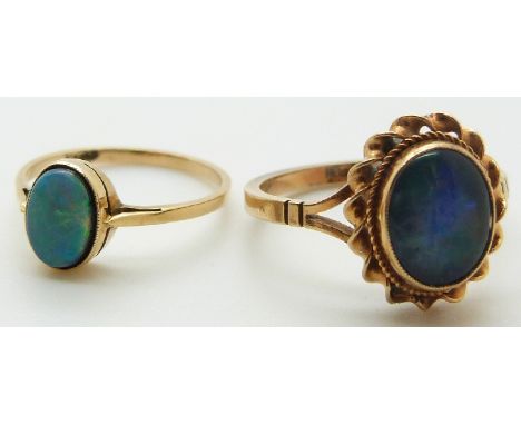 Two 9ct gold rings, one set with an opal doublet and the other an opal triplet, 3.9g