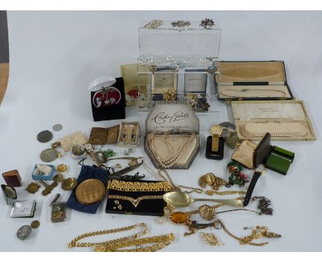 A collection of costume jewellery including brooches, Monet earrings, 9ct gold pearl earrings, Sphinx necklace, Exquisite bro