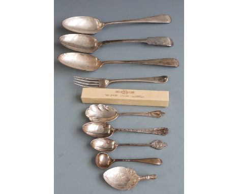 Three hallmarked silver table spoons, Georgian hallmarked silver fork and various hallmarked silver spoons, weight 307g and a