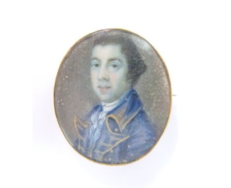 An early Victorian brooch set with a portrait miniature of a gentleman, 2.7 x 3.2cm
